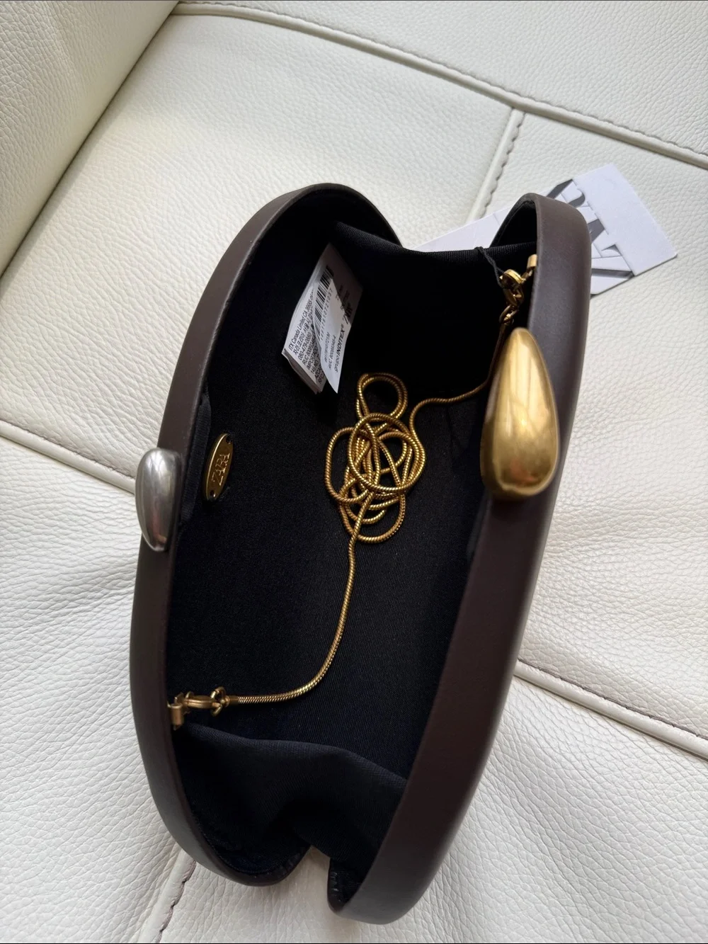 Zara Oval Dark BrownClutch with Metallic Accents